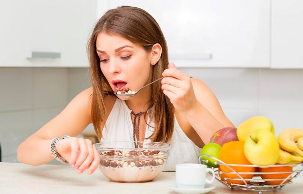 Girl controls the speed of food intake